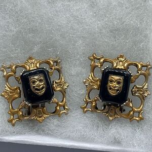 Vintage mask ornate clip earrings.